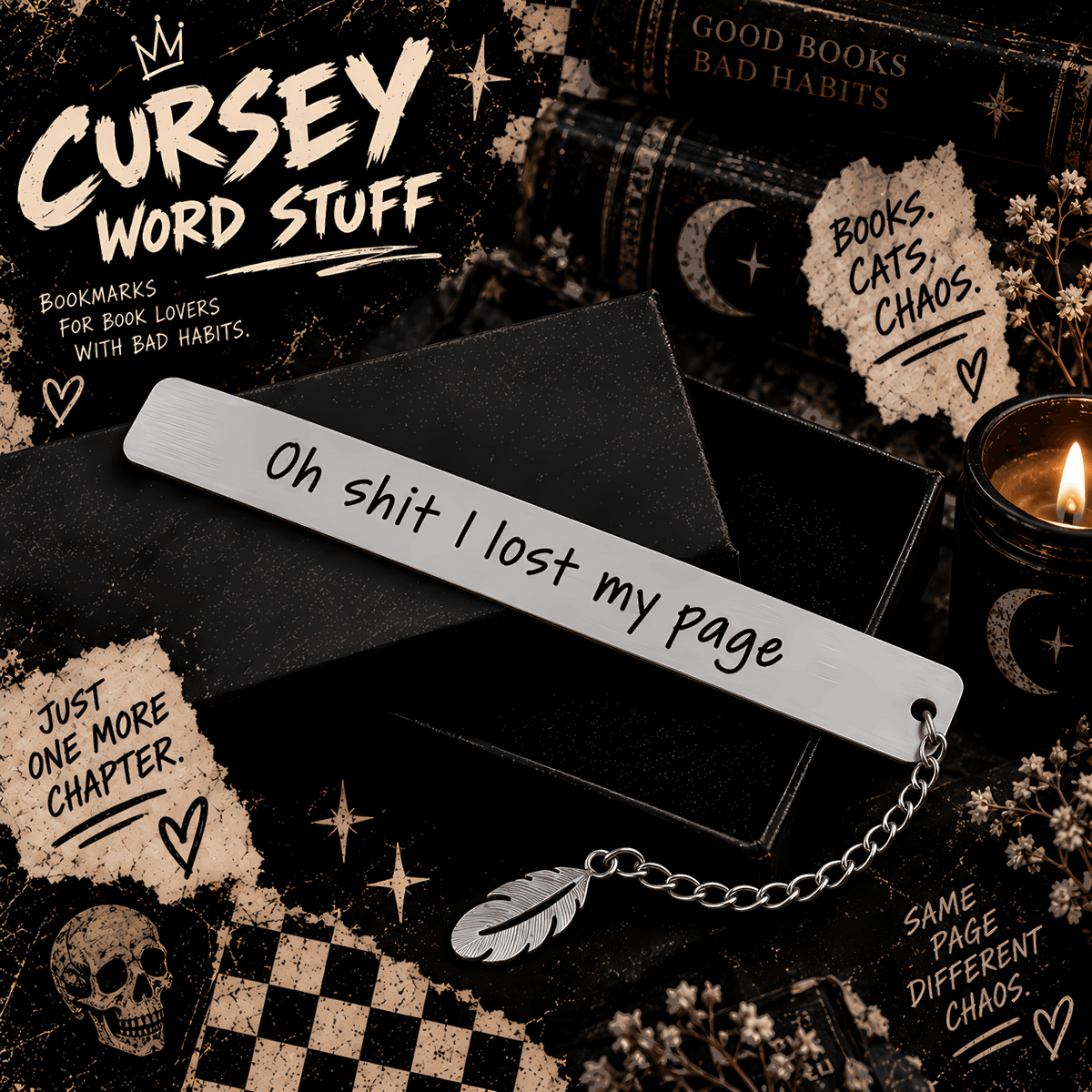 A silver metal bookmark with the phrase 'Oh shit I lost my page' in black script, attached to a small feather-shaped charm and chain. The bookmark is displayed on a black book box surrounded by gothic-themed props including old books, a lit candle, a skull, and torn paper notes with book-themed quotes.