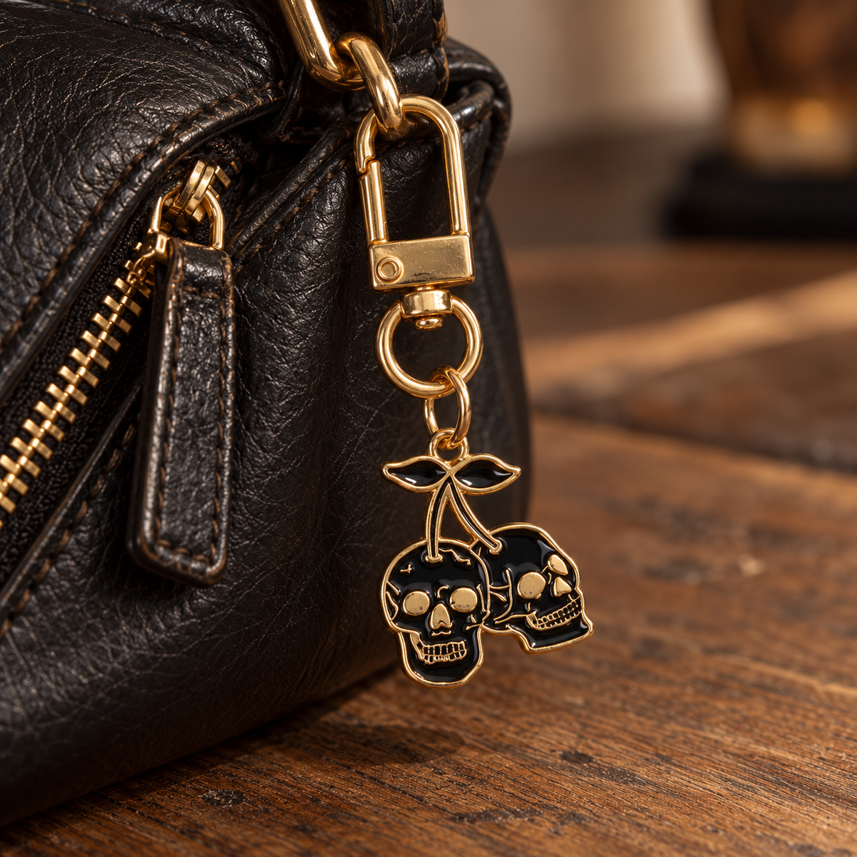 Black and gold cherry skull bag charm
