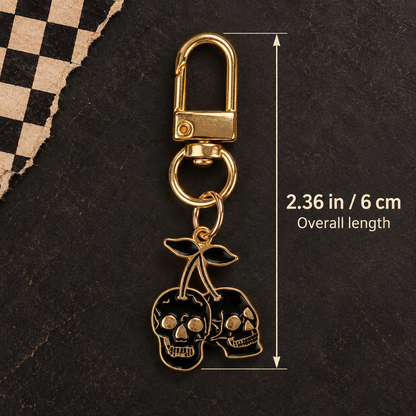 Black and gold cherry skull bag charm